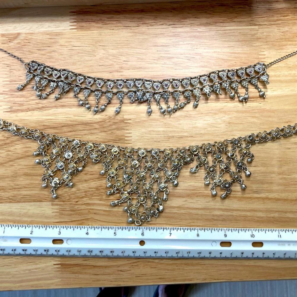 Pair of silver necklaces